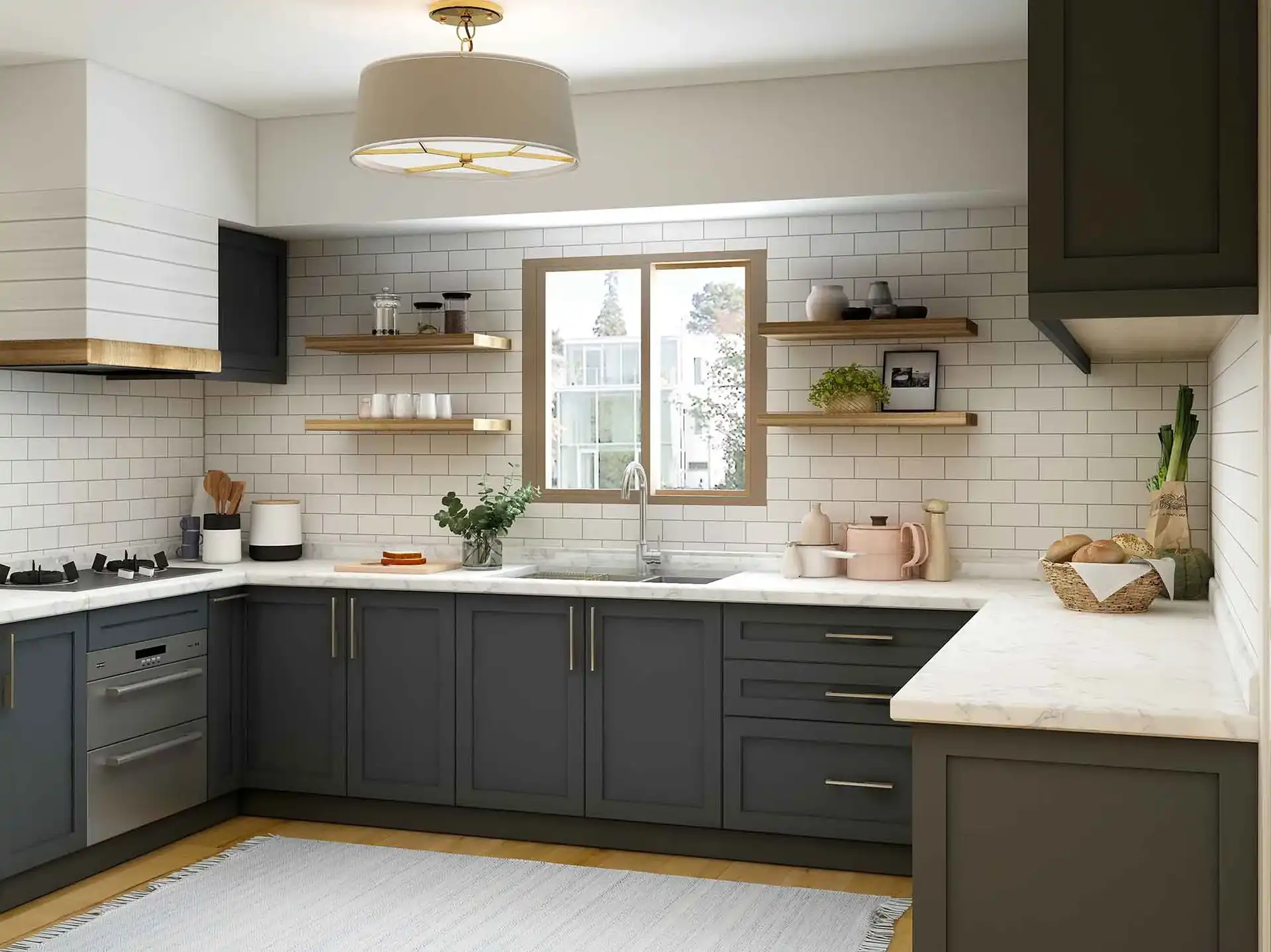 An image of a kitchen with dark grey shaker style cabinets, wooden floating shelves, white subway tile backsplash, and stainless steel appliances.