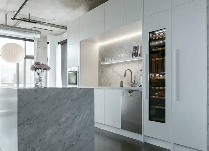 A photo of an IKEA Sektion kitchen with white slab cabinet doors.