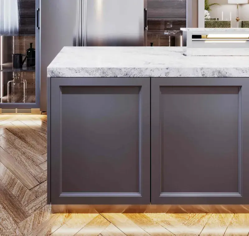 An image of a kitchen island with decorative gable panels in a grey framed shaker design.