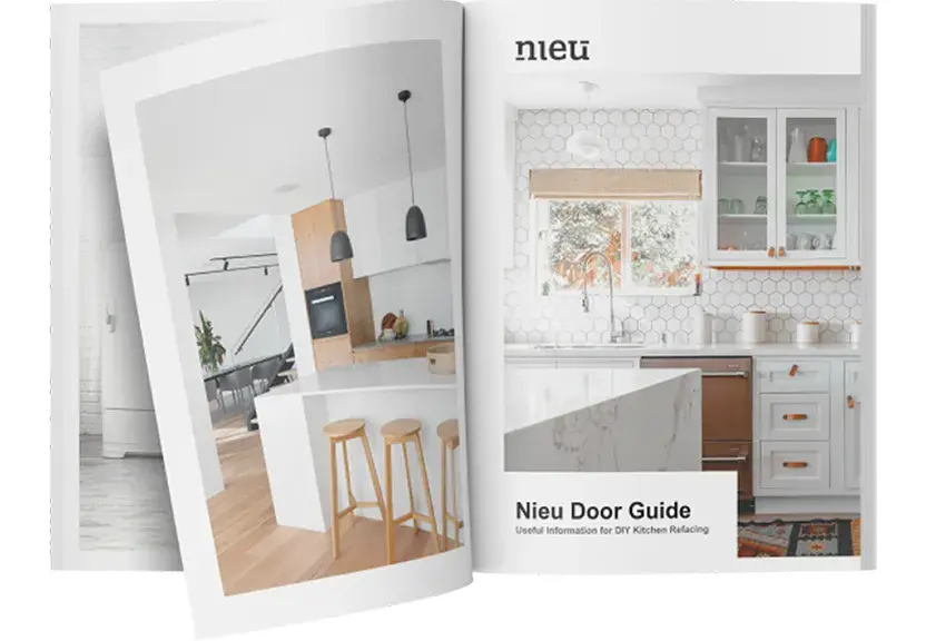 An image of the Nieu Cabinet Doors Guide booklet with open pages.